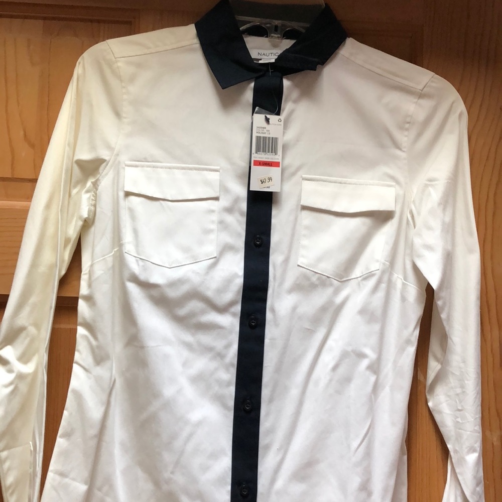 White with navy blue collar and cuff